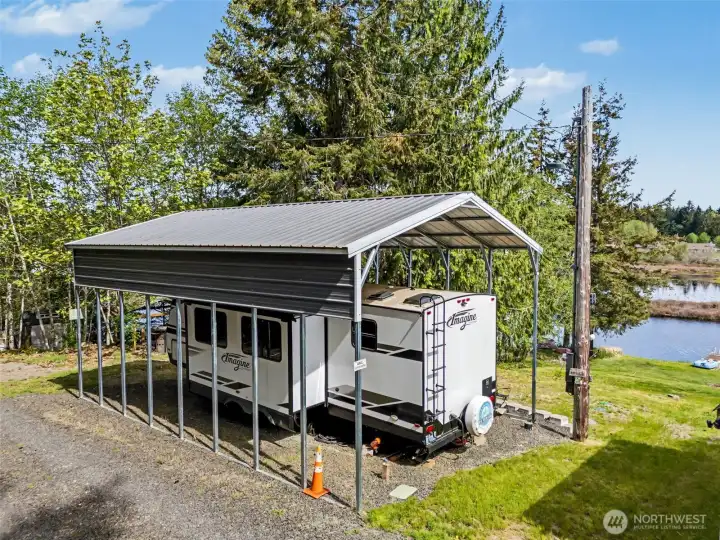 Elevated view of RV setup showing proximity to water
