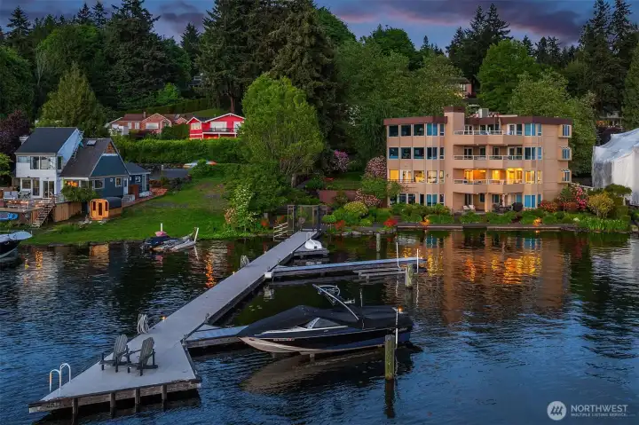 As the sun melts into the horizon, the private gated dock extends into the still waters of Yarrow Bay — a front-row seat to some of the most breathtaking sunsets on Lake Washington. With a boat lift permit already in place, the only thing missing is your vessel.