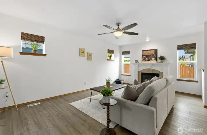 Living room features a cozy gas fireplace.