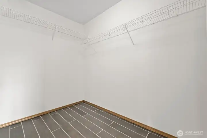 Primary suite walk-in closet.