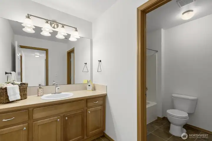 Second full bathroom with vanity.