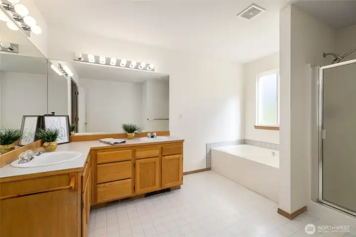 This primary en-suite is huge!  Two vanities, soaking tub, separate shower.
