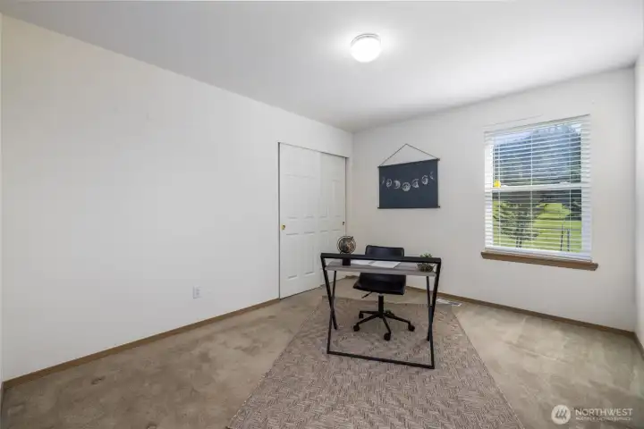 One of two guest bedrooms, or a great work from home (WFH) space with nice views of Little Mountain.