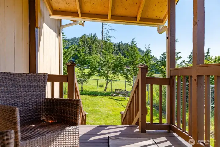 Covered deck, fenced back yard, and Little Mountain views.
