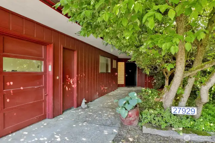 Covered front entry with two car garage with front and back door access, and interior door into the home. Covered front entry with two car garage with front and back door access, and interior door into the home.