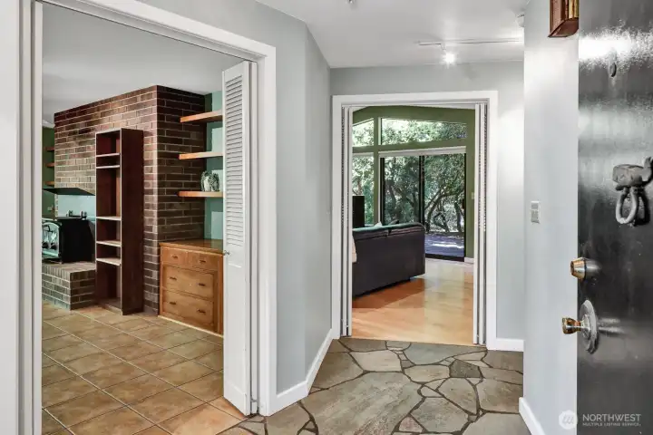 Front door slate entry opens to the living room, family room open to kitchen, hallway to the right for the bedrooms and full bath. Front door slate entry opens to the living room, family room open to kitchen, hallway to the right for the bedrooms and full bath.