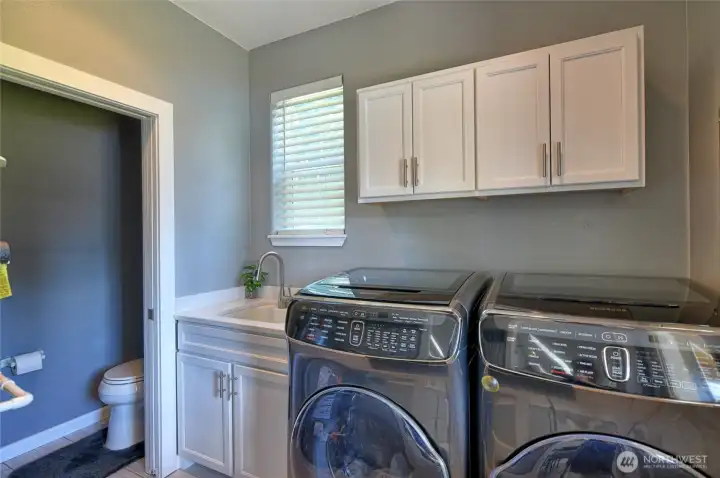 Laundry room washer and dryer stay with home, half bath room too. Laundry room washer and dryer stay with home, half bath room too.