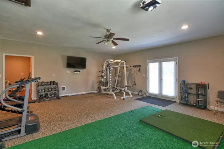 Looking at front french doors entering the workout/playroom. Looking at front french doors entering the workout/playroom.