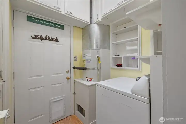 Laundry room with access to back yard Laundry room with access to back yard