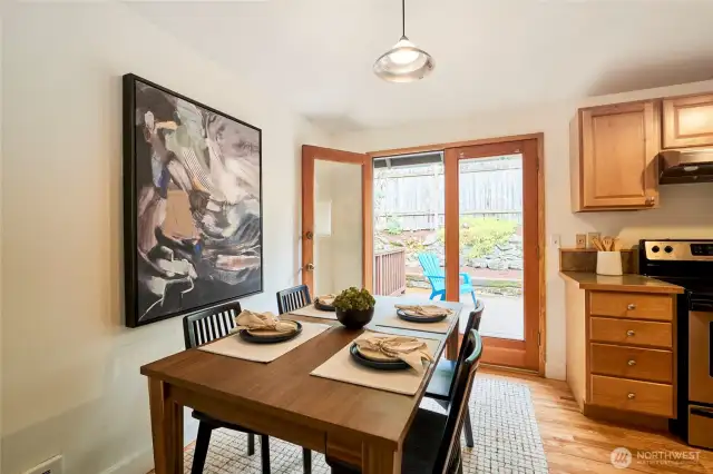 Kitchen & dining area connects to back deck.