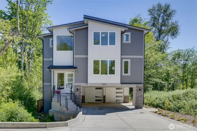 Gorgeous 3-level home with carport AND garage!