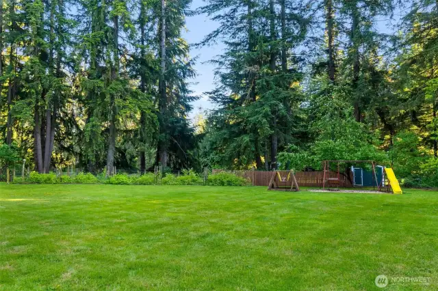 Spacious outdoor play areas. Picture volleyball nets or horseshoe pits.