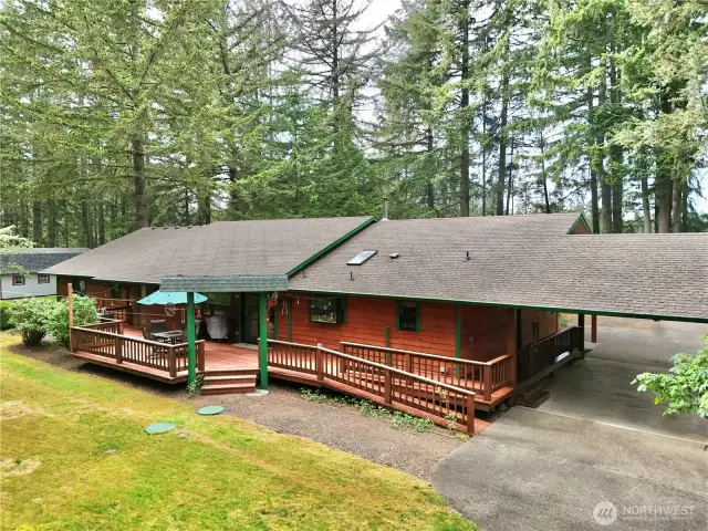 Large BBQ patio accessed from the kitchen area. Room for a hottub.