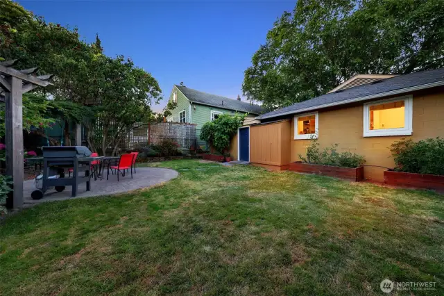 Beautiful fully fenced backyard with sitting area for BBQ's and gatherings.