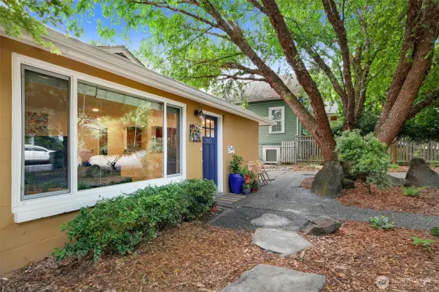 Large window into living room provides lots of light yet is set back off the street, one has abundant privacy.