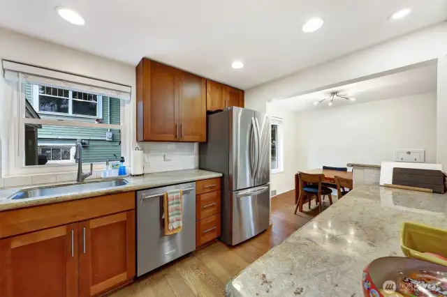 Granite countertops including the peninsula.