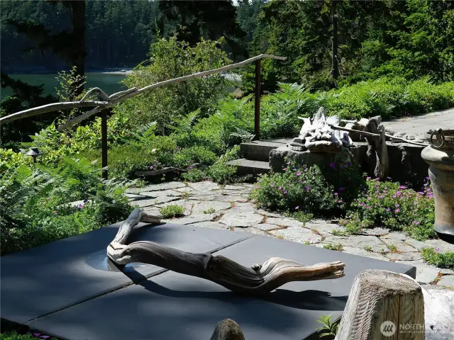 Large waterfront patio with an in-ground hot tub!
