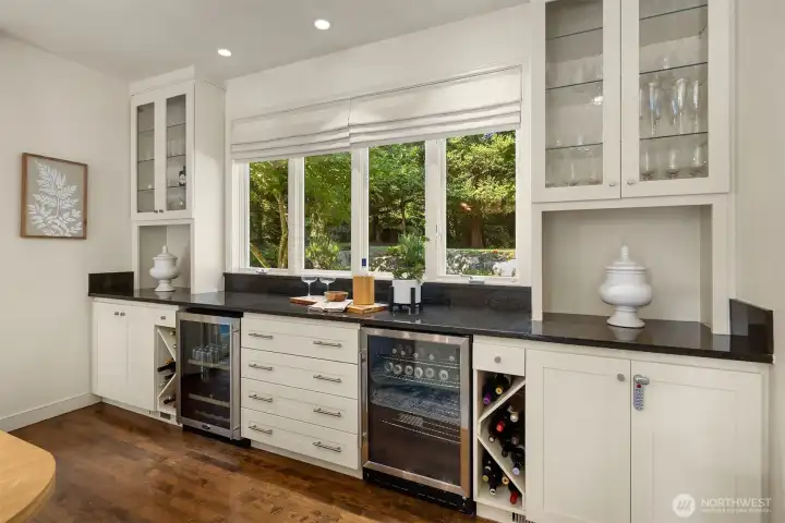Built-in dining room buffet bar, cabinetry, wine storage & 2 undercounter beverage fridges