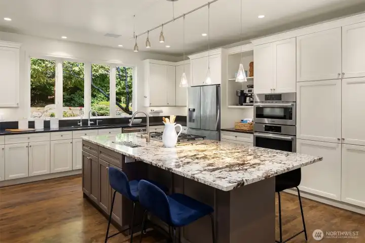 Spacious, gourmet kitchen with Bosch appliances & plenty of pantry cabinets