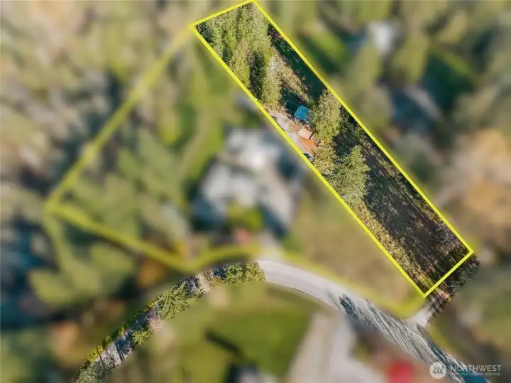 Images may include imposed graphics depicting estimated property lines and directions; buyer to verify accuracy