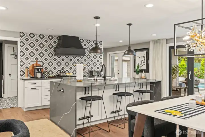 Updated dream kitchen with center island, quartz, stainless appliances.