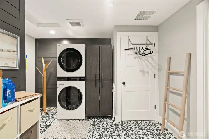 Large laundry room with lots of storage.
