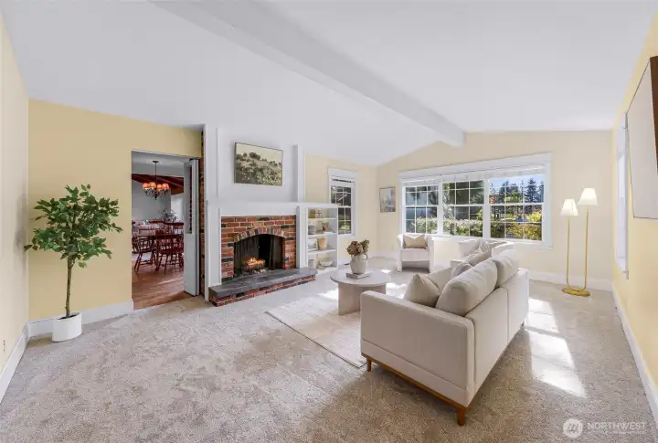 Vaulted ceilings and abundant windows make the room feel roomy and bright