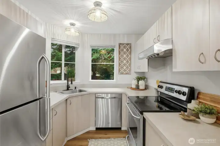 Bright kitchen refreshed with new lighting and faucet