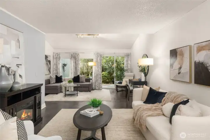 Walk down to a fully updated open concept level. Full of natural light and extended space with a living room bump out extension. You get more in Unit #181.