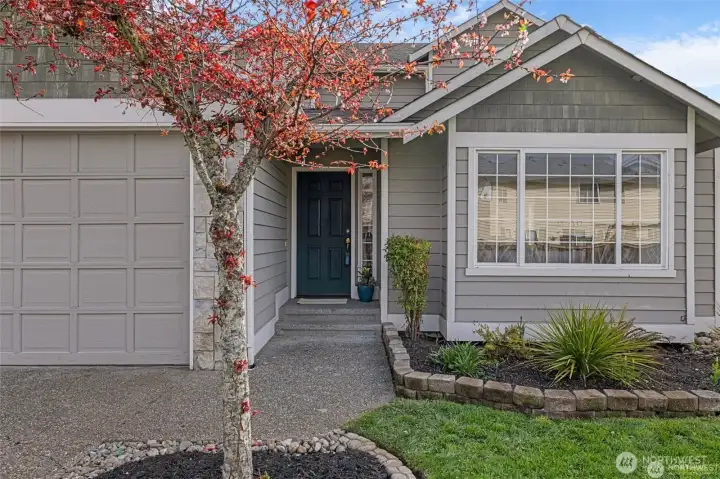 Welcome to Your Cobblestone Sanctuary!  Step inside and feel the immediate lift of soaring vaulted ceilings and natural light that define this move-in-ready gem.