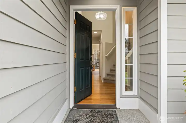 Welcome to Your Cobblestone Sanctuary!  Step inside and feel the immediate lift of soaring vaulted ceilings and natural light that define this move-in-ready gem.