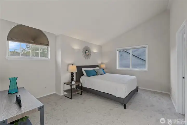 A Private Sanctuary: The Primary Suite  ?Retreat to a primary suite that feels more like a personal oasis. The grand scale of the room is immediately elevated by vaulted ceilings, creating an airy, peaceful retreat at the end of a long day.  ?The experience continues in the private ensuite, where you can unwind in the oversized soaking tub or enjoy the convenience of a sleek dual-sink vanity. Complete with a massive walk-in closet that offers ample space for every season, this suite is the perfect blend of architectural beauty and everyday luxury.