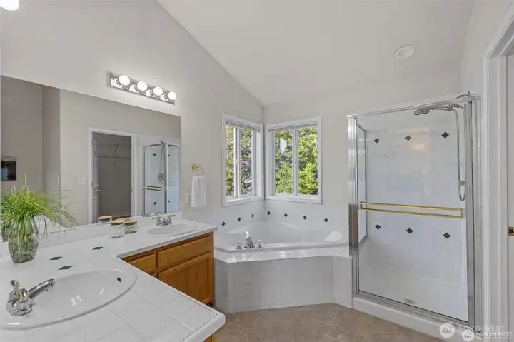 Your Private Outdoor Haven  Step outside to a fully fenced 6,098 sf backyard designed for both play and relaxation. This secure sanctuary features a spacious patio perfect for summer BBQs and alfresco dining, while dedicated gardening spaces invite you to cultivate your own PNW oasis. Whether it’s a secure area for pets to roam or a quiet corner for your morning coffee, this versatile outdoor retreat seamlessly extends your living space into the fresh air.