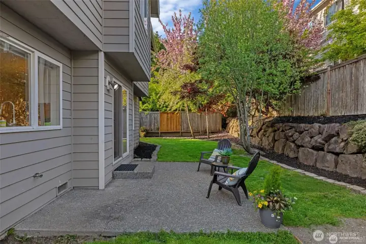 Your Private Outdoor Haven  ?Step outside to a fully fenced 6,098 sf backyard designed for both play and relaxation. This secure sanctuary features a spacious patio perfect for summer BBQs and alfresco dining, while dedicated gardening spaces invite you to cultivate your own PNW oasis. Whether it’s a secure area for pets to roam or a quiet corner for your morning coffee, this versatile outdoor retreat seamlessly extends your living space into the fresh air.