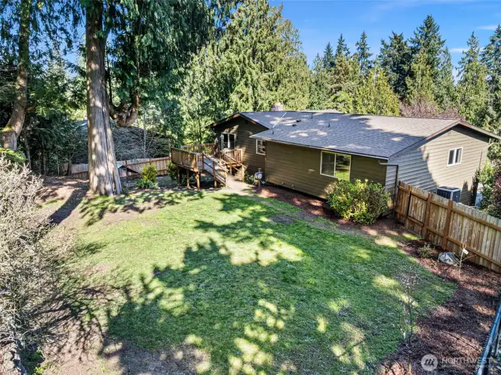 spacious & fully fenced backyard