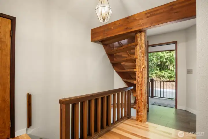 Entry way with stairs up to reading nook loft