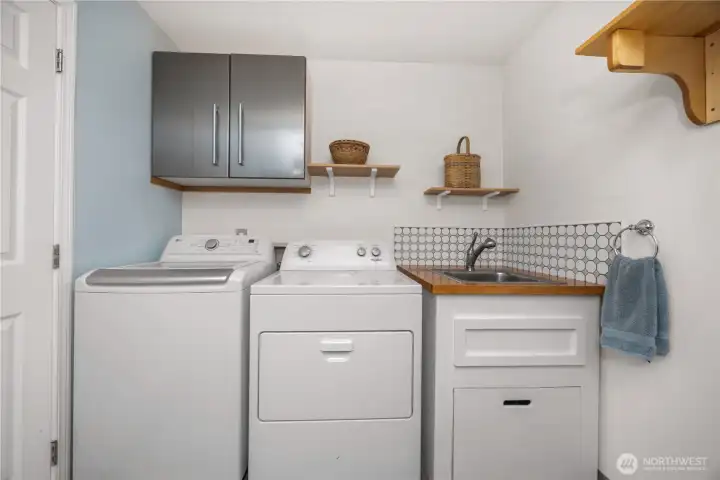 Massive Laundry and Storage room.