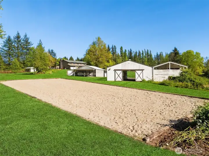 Virtual arena under the topsoil is a level base of gravel- awaitng your choice of footing (approximately 180x60)