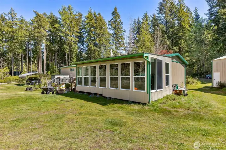Added sunroom that is not attached to the building