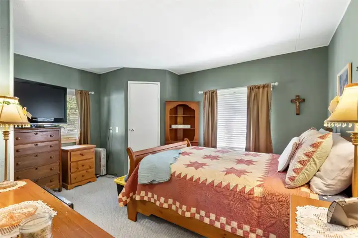 Spacious bedroom with small walk in closet