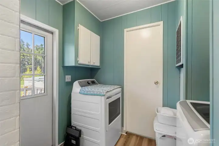 Utility room and door to back yard