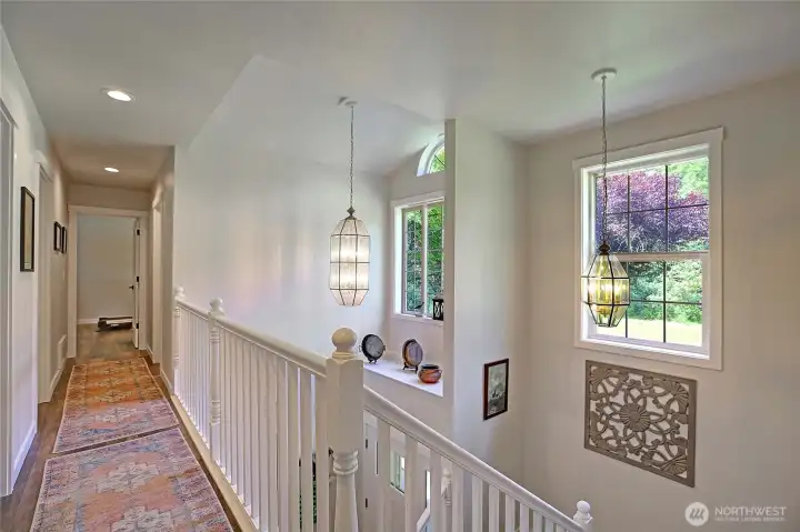 Follow the hallway to the additional bedrooms, a flexible bonus space, and the home's second full bathroom.