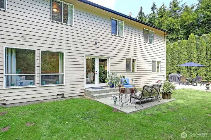 An additional patio off the dining room offers the perfect extension of your living space, ideal for barbecues, outdoor dining, and relaxing with family and friends.