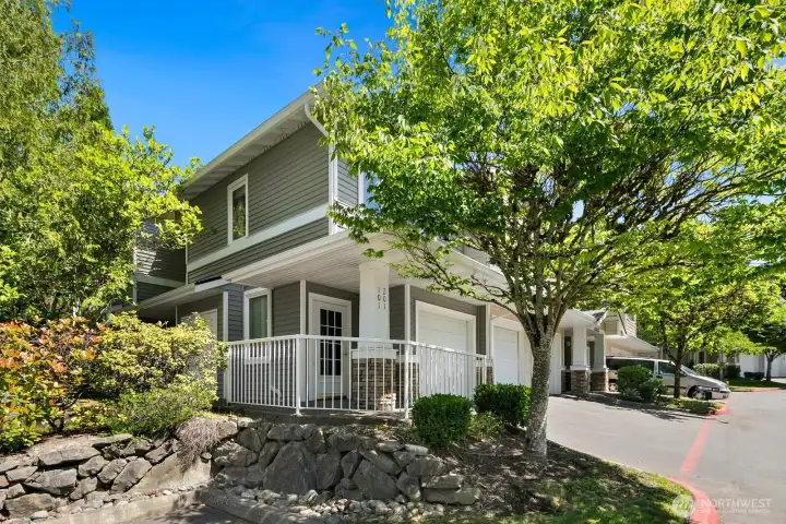Spacious two bedroom, two bathroom end-unit condo overlooking trees and a community park.