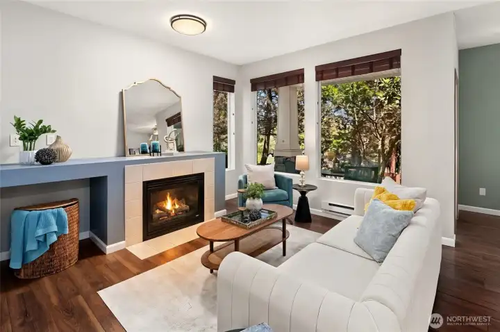 Spacious and comfortable living space with beautiful fireplace.