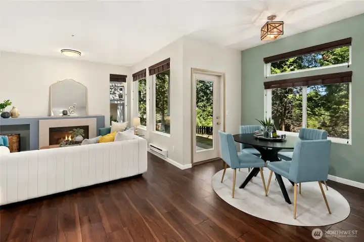 Large new windows (2025) and high ceilings fill the home with beautiful morning light.