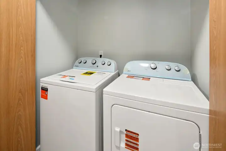 Laundry with brand new washer and dryer included.