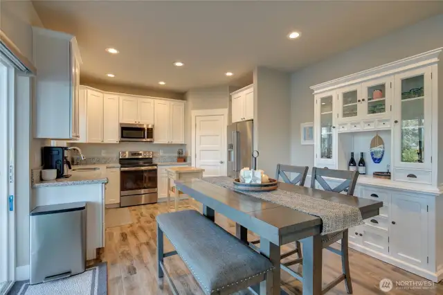 Dining area is in line with the slider to the sunroom.