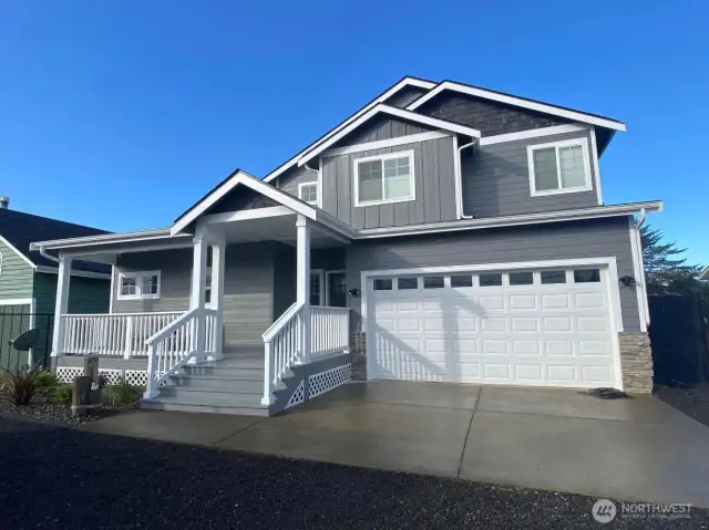 Fully fenced, beach friendly, low maintenance landscape and a covered front porch welcome you on to the property.
