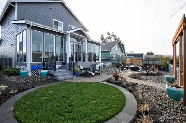 Moving along to the back yard....we once again have low maintenance landscaping, all designed to enjoy entertaining and outoor living.